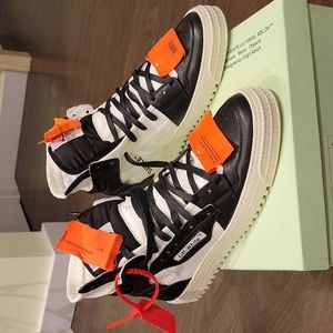 Size 12 off white high tops.  Black and white